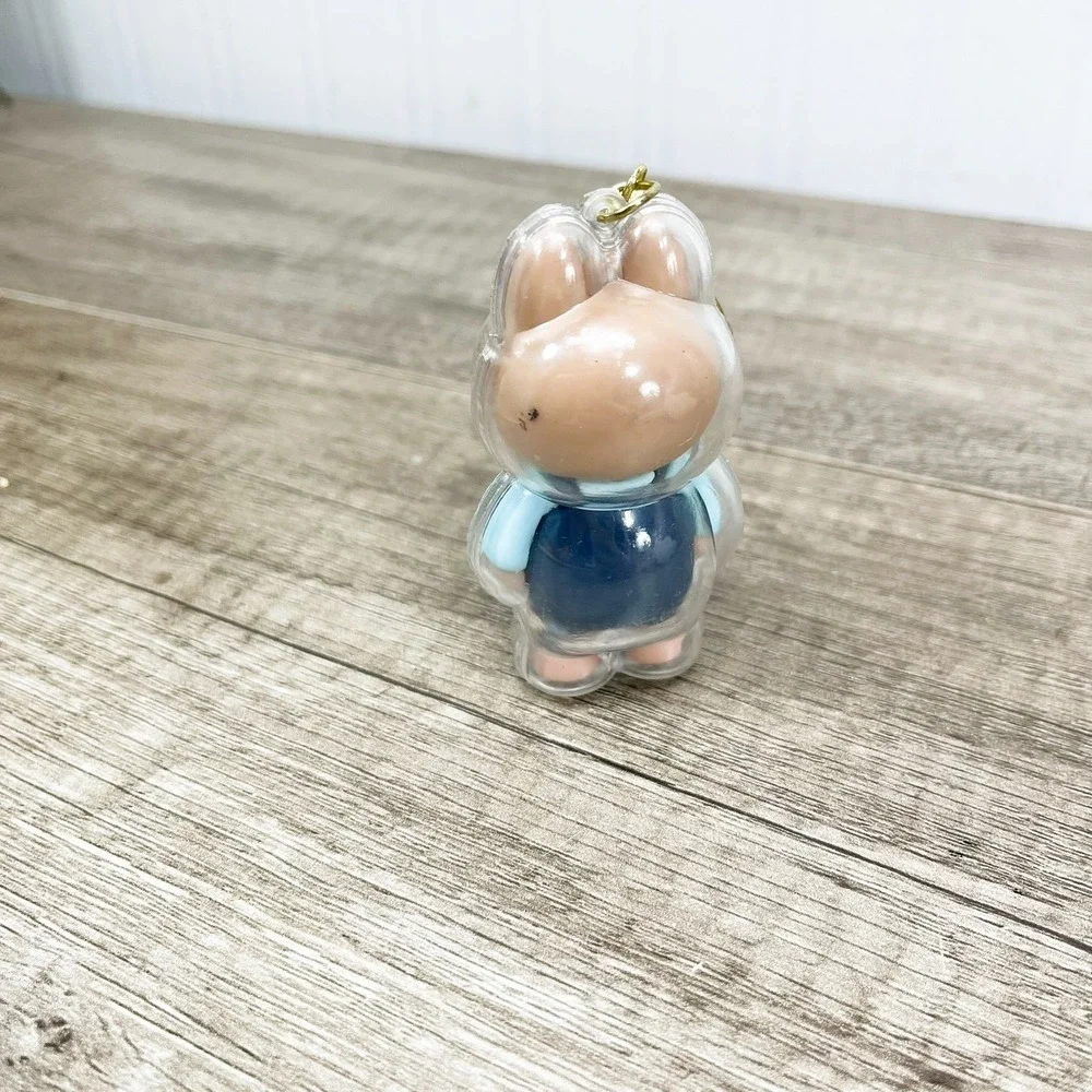 Labubu Monster Art Toy Keychain Blue Overalls Clear Protective Case Gold Tone
